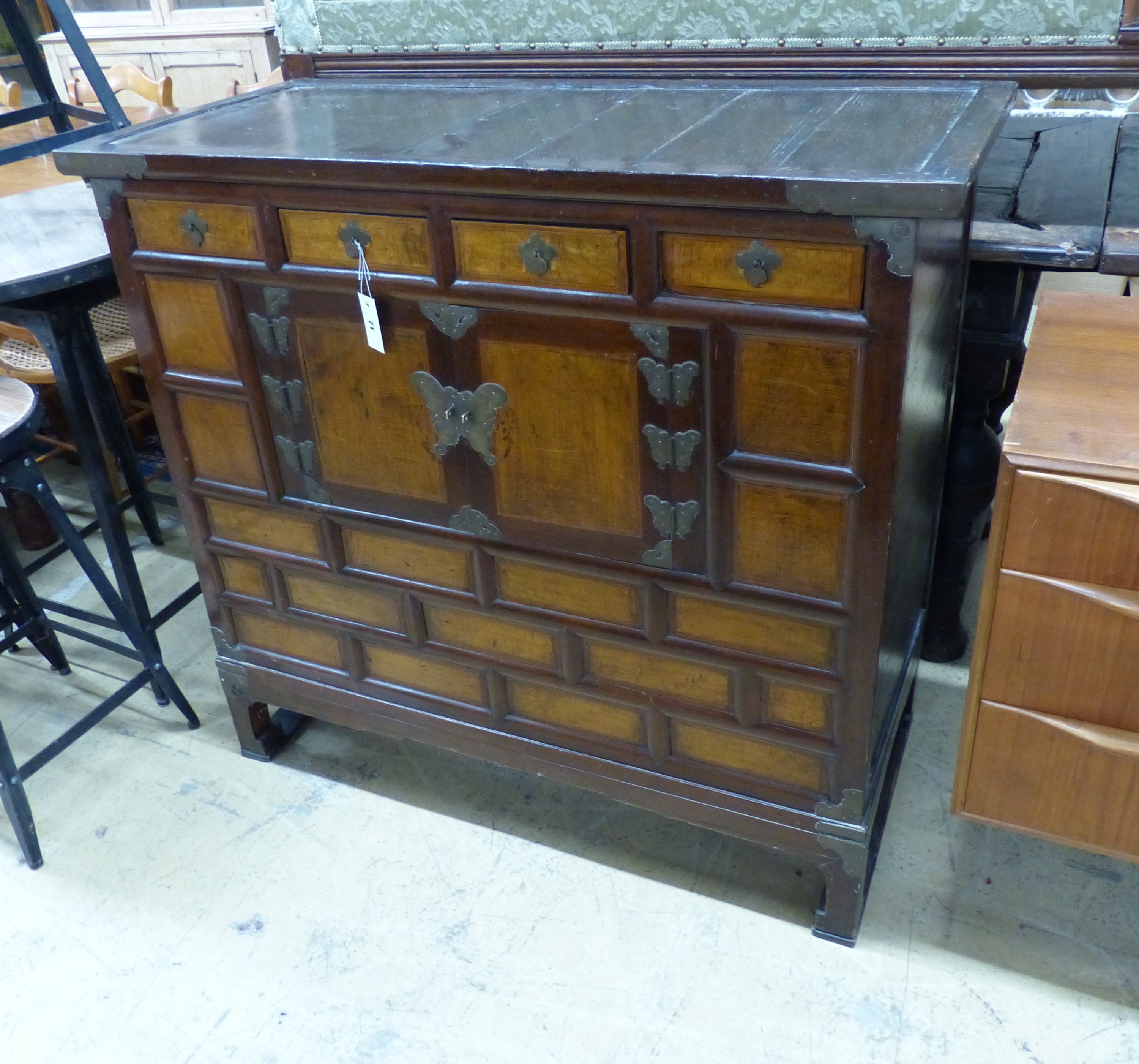 A Chinese elm cabinet, width 111cm